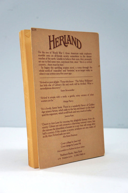 Book titled 'Herland' with text on a white background