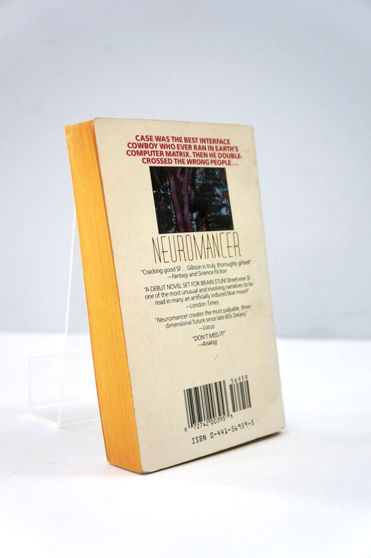 Back cover of a book titled 'Neuromancer' with a barcode on a white background