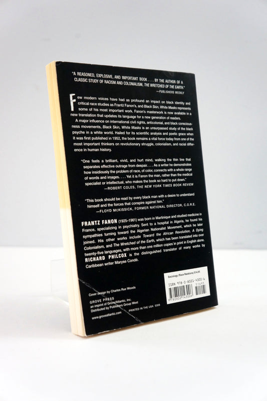 back cover of black skins, white masks by Frantz Fanon 