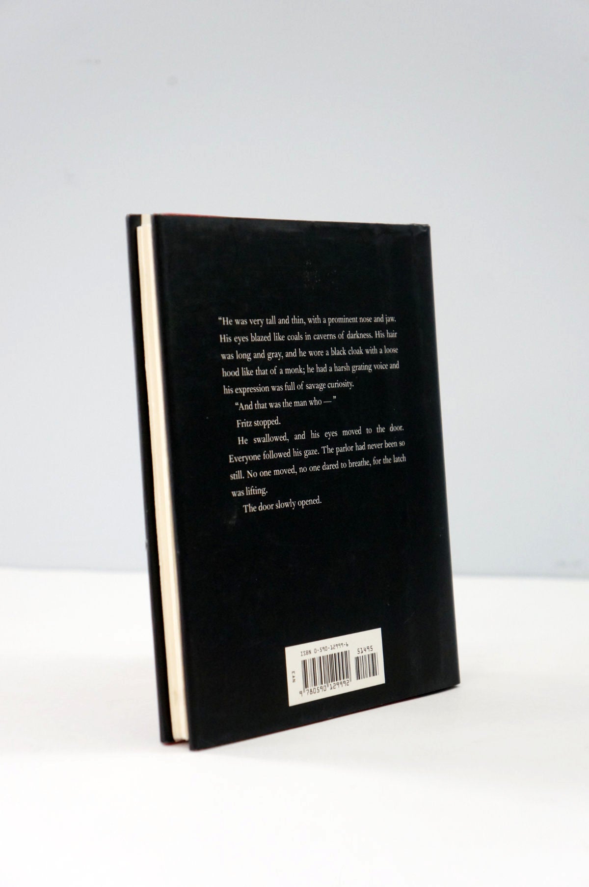 Black book with text on a white background