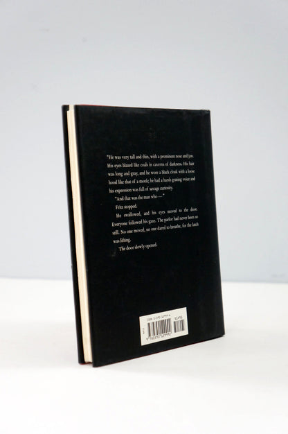 Black book with text on a white background