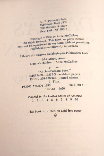 A photographed book interior page showing printed copyright and publication information on aged off-white paper.