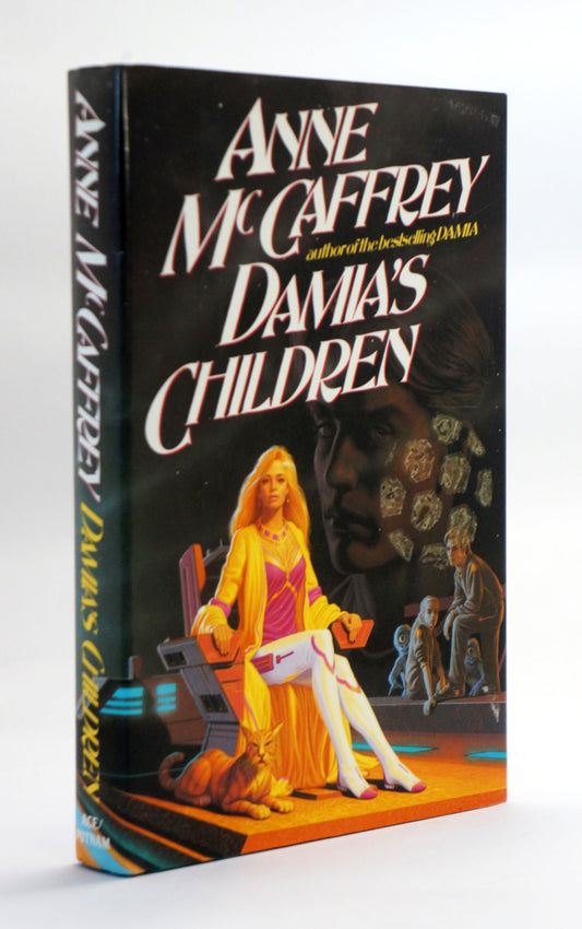 A vintage hardcover book of Anne McCaffrey's 'Damia's Children' shown at a three-quarter angle against a plain white background.