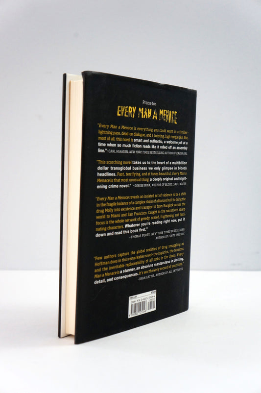 Book with black cover and yellow text on a white background