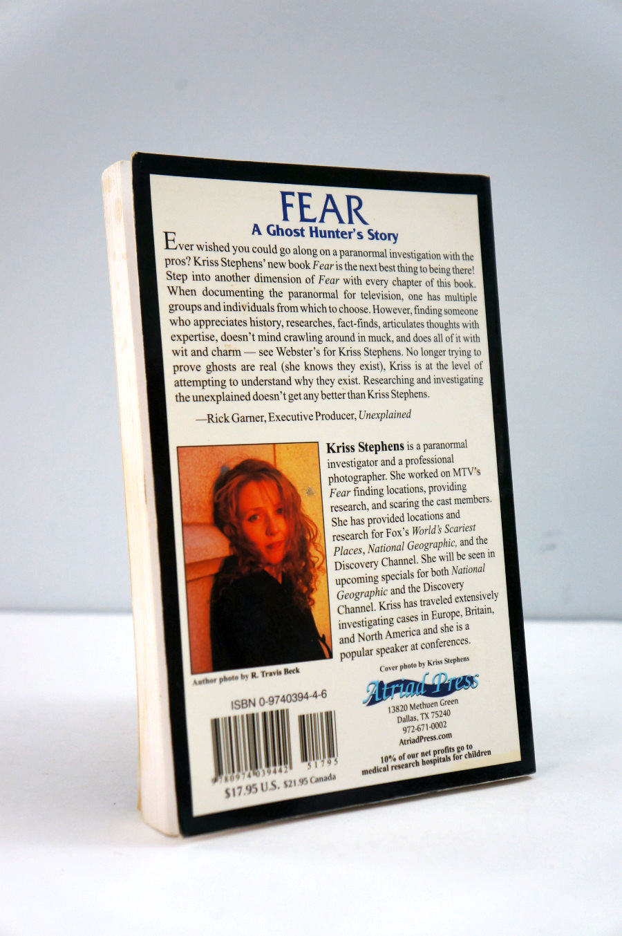 Book cover of 'Fear: A Ghost Hunter's Story' with text and a photo of a woman on a white background