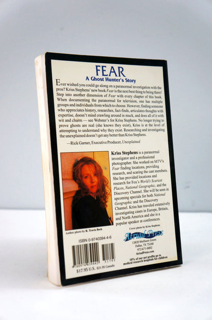 Book cover of 'Fear: A Ghost Hunter's Story' with text and a photo of a woman on a white background
