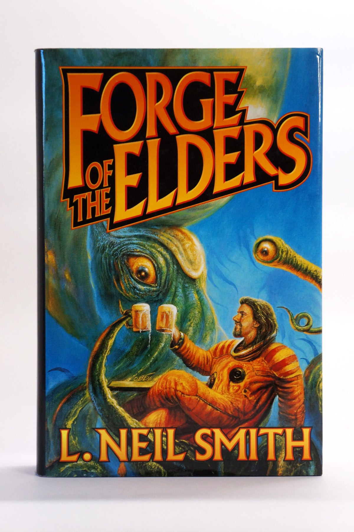 Vintage hardcover copy of the Forge of Elders by L. Neil Smith on a white background.