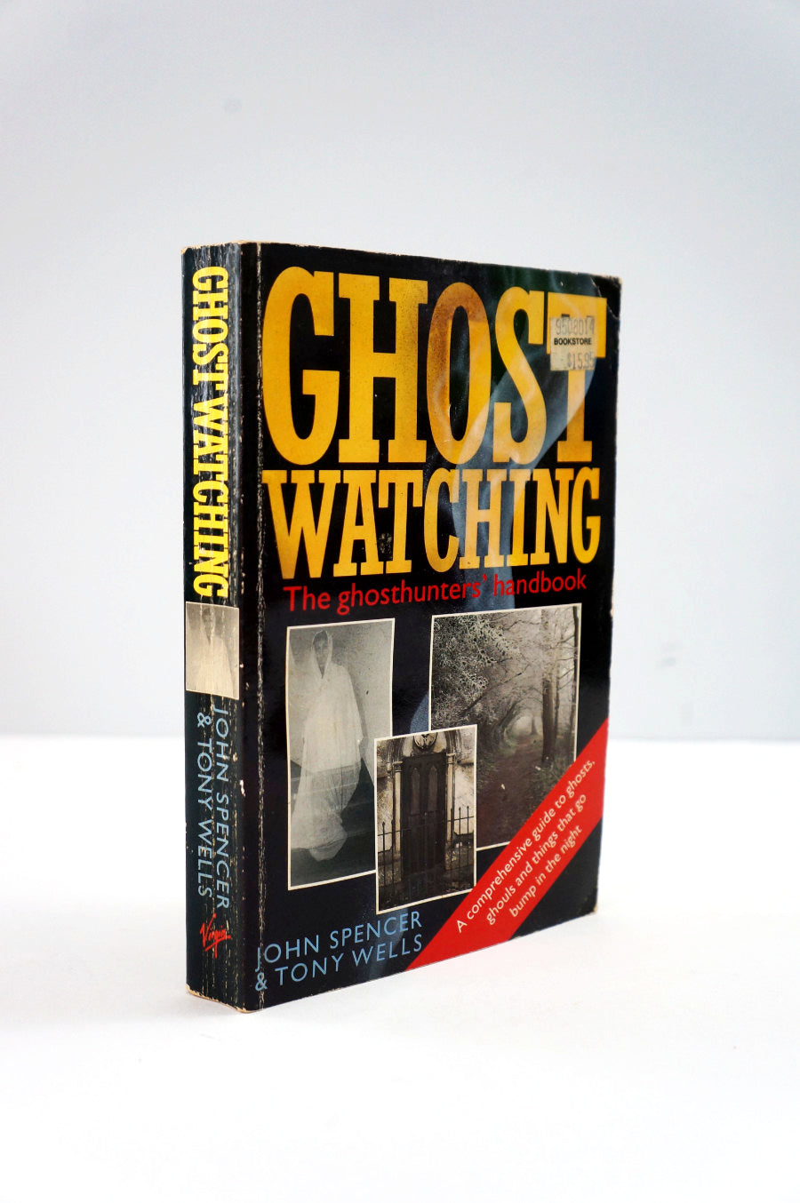 Book titled 'Ghost Watching' by John Spencer on a white background