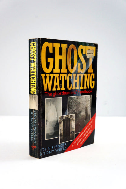 Book titled 'Ghost Watching' by John Spencer on a white background