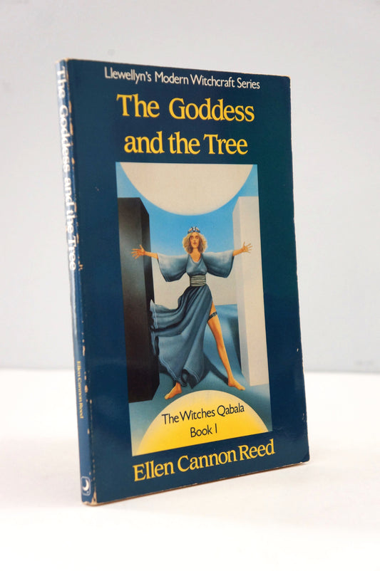 Book titled 'The Goddess and the Tree' by Ellen Cannon Reed on a white background