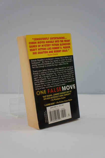 Back cover of a book titled 'One False Move' with text and a yellow label on a white background.
