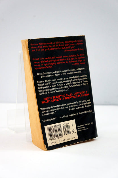Back cover of Haunted America with text and a barcode on a white background
