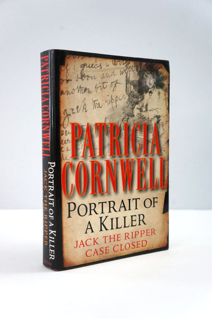 Book titled 'Portrait of a Killer: Jack the Ripper Case Closed' by Patricia Cornwell on a white background