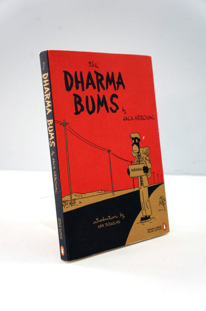 Book titled 'The Dharma Bums' by Jack Kerouac on a white background