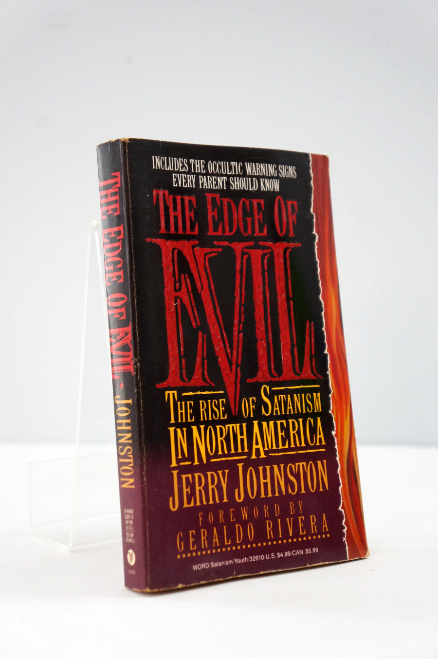 Book titled 'The Edge of Evil: The Rise of Satanism in North America' by Jerry Johnston on a white background