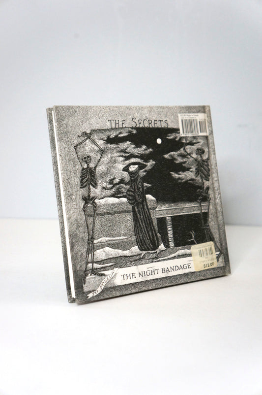 Back cover of The Secrets Vol 1: the Other Statue by Edward Gorey