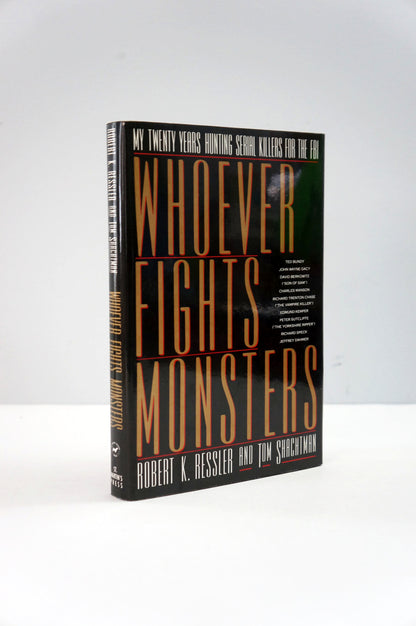Book titled 'Whoever Fights Monsters' on a white background